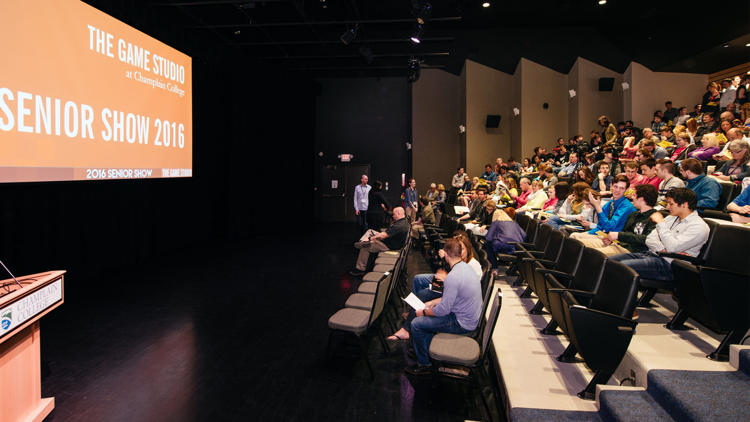 attendees gather to watch the 2016 game studio senior show