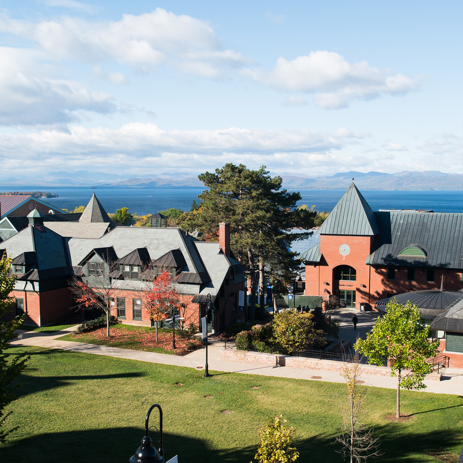 Champlain school buildings with the lake and mountains in the background