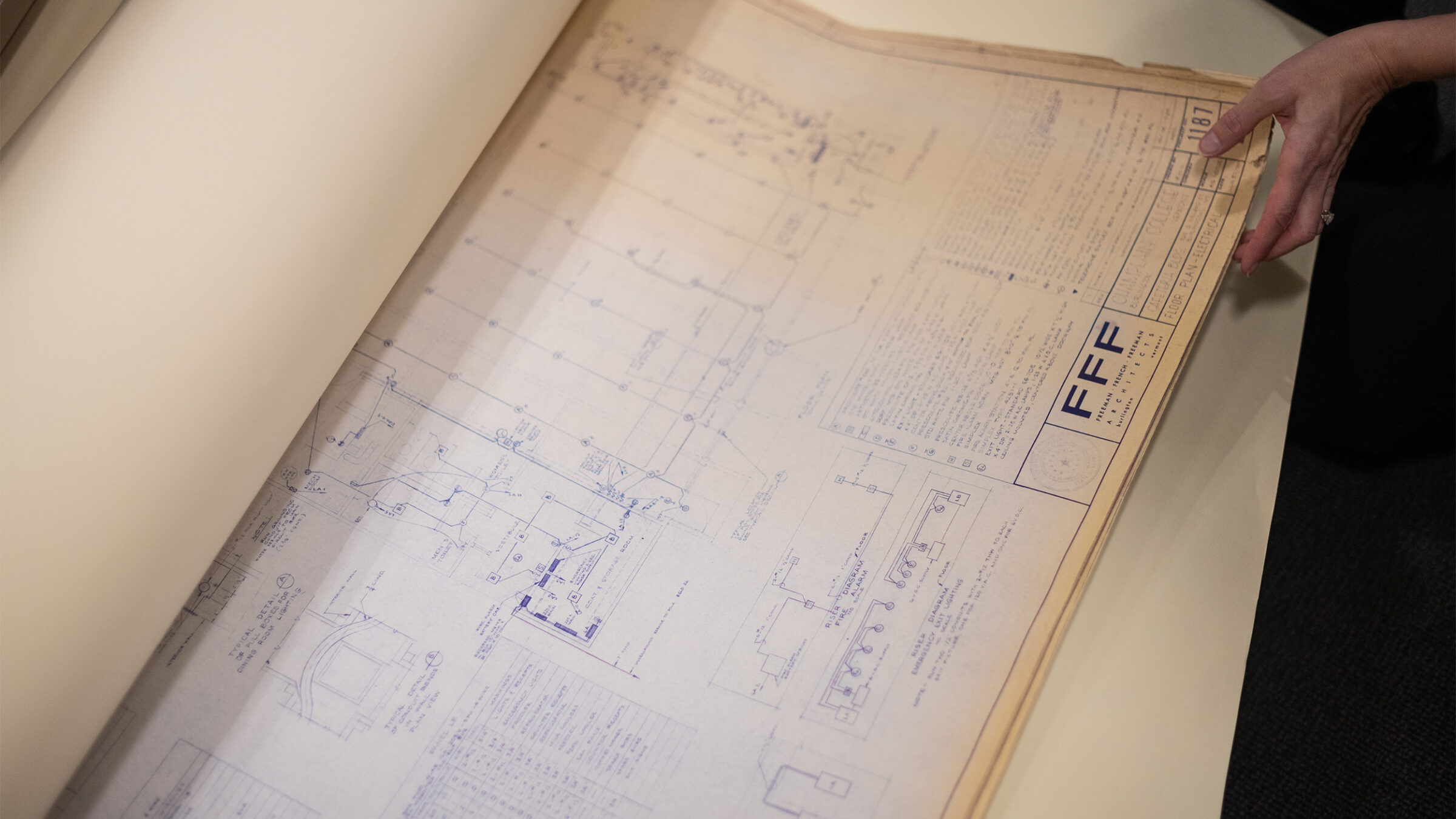 A draft blueprint of a Champlain College building, labeled cafeteria building