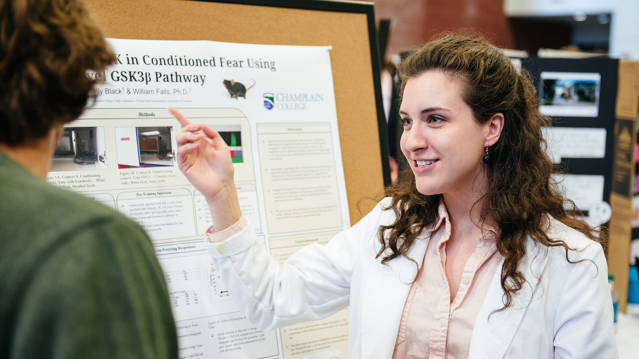 a student presents her capstone project in psychology