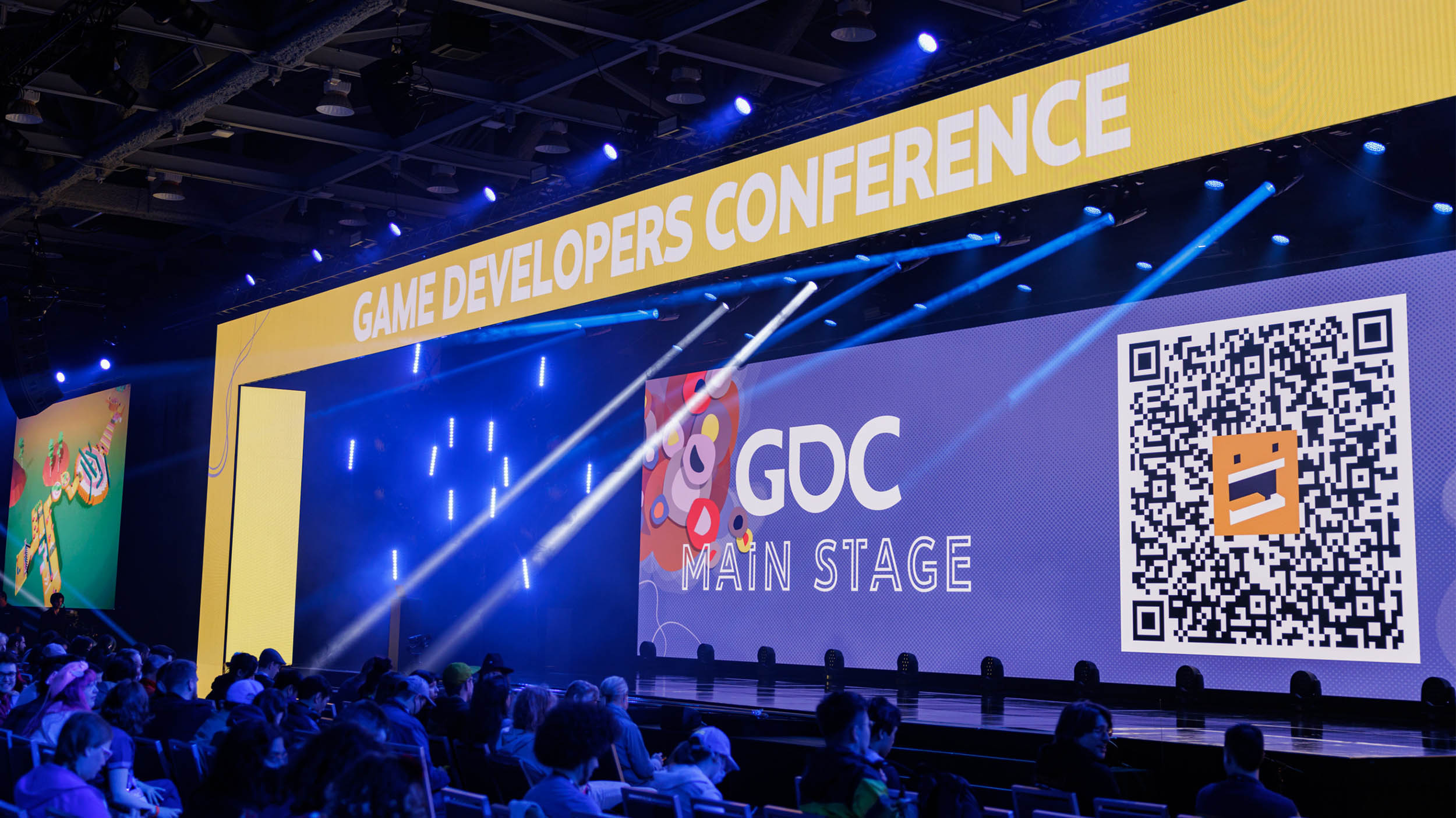 a wide shot of the main presentation stage at the game developers conference