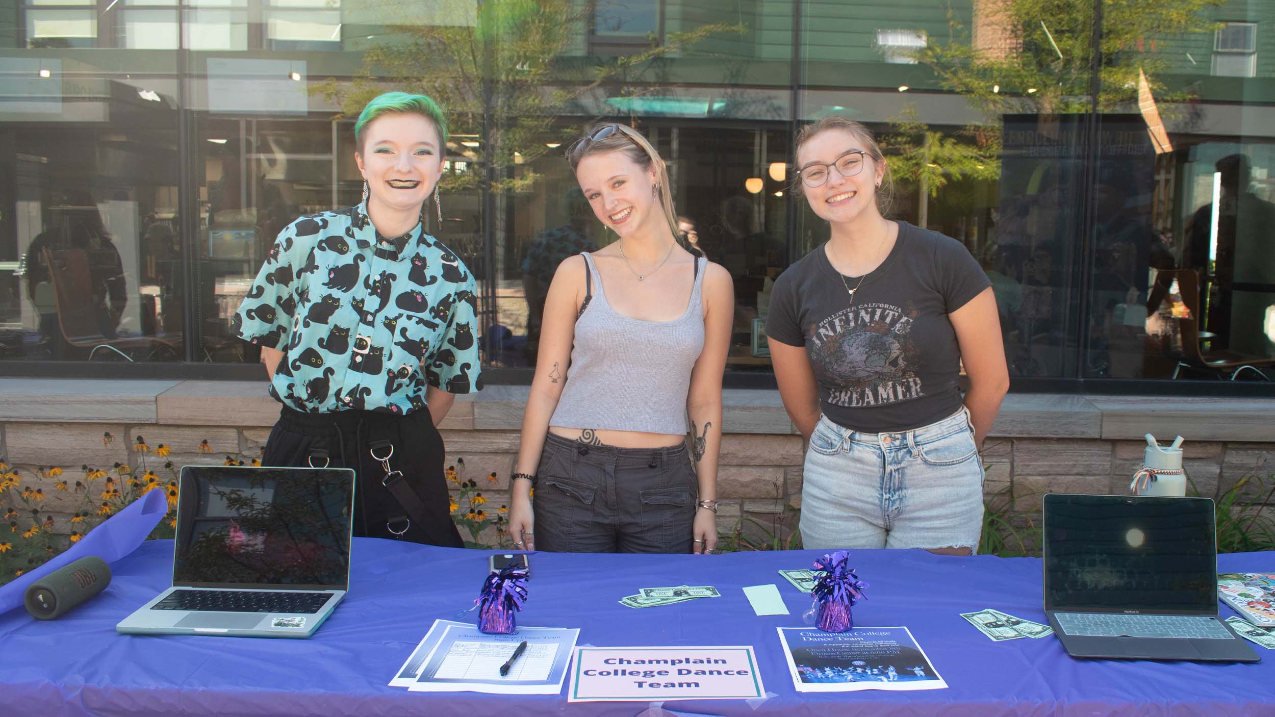 Champlain Dance Team members tabling at the activity fair on campus