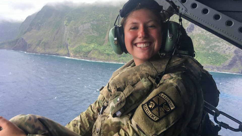 ROTC cadet in helicopter over water