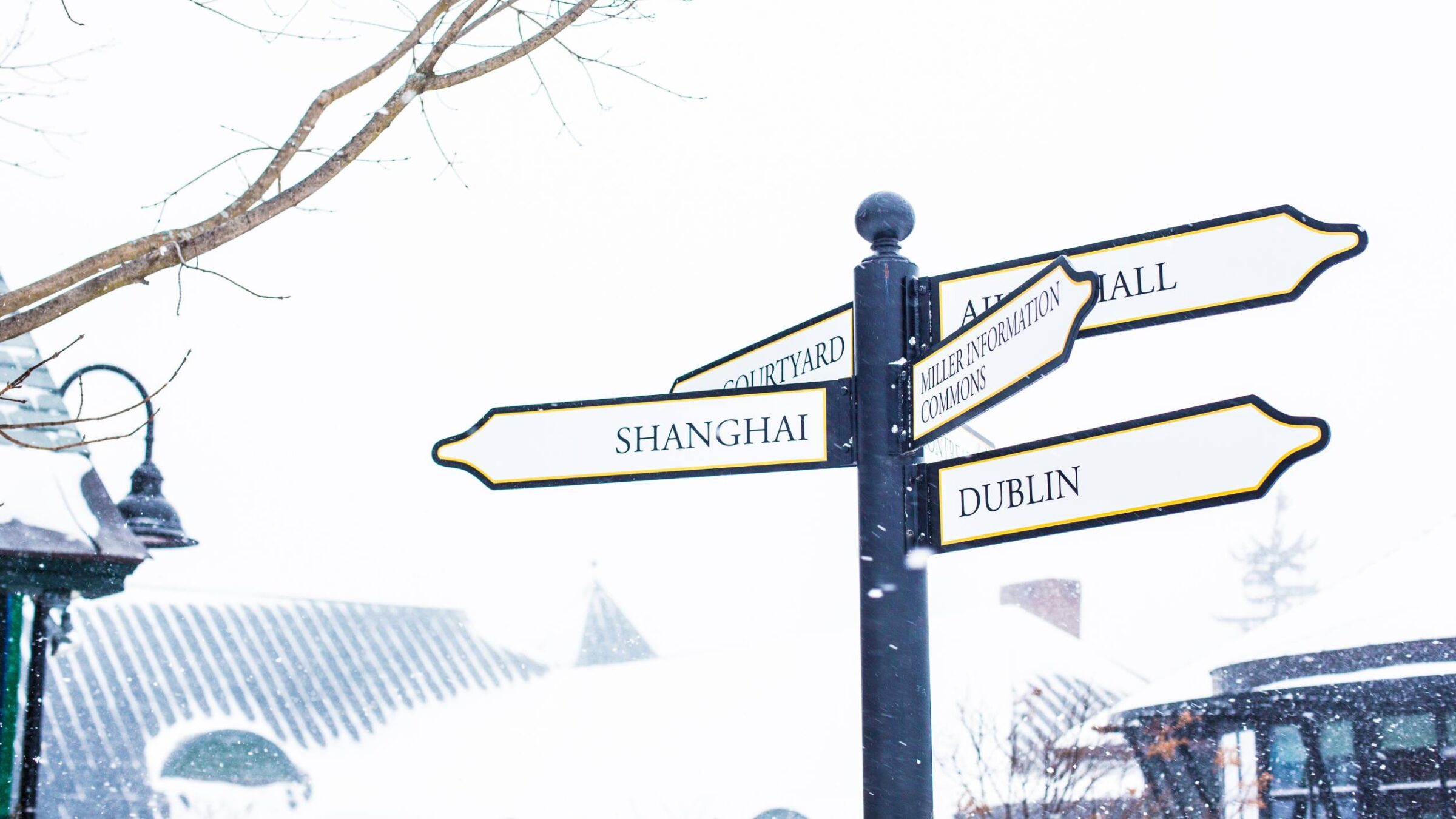 campus directional sign in the snow