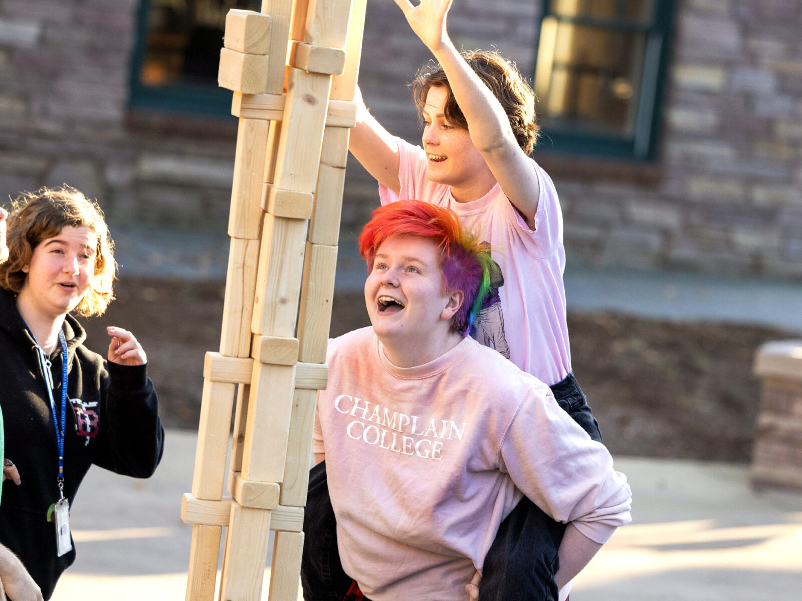 students play a games of oversized jenga