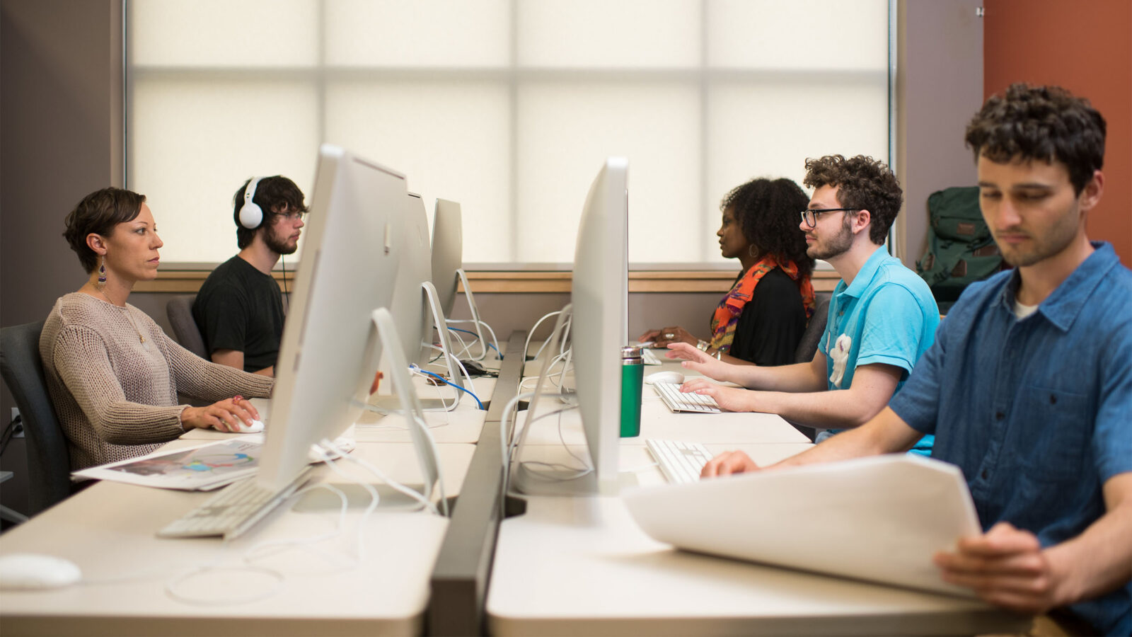 students individually working on mac computers in a ccm computer lab