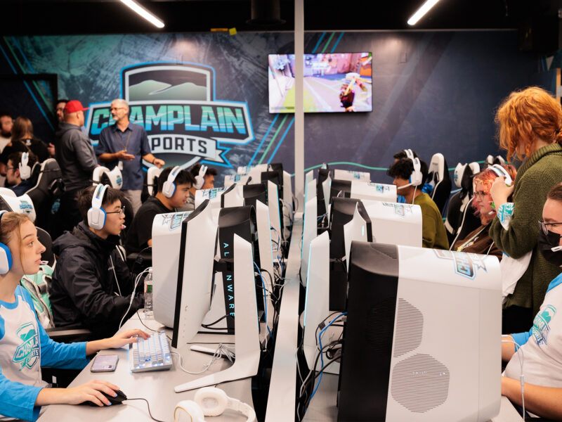 Many students competing on computers in the esports arena