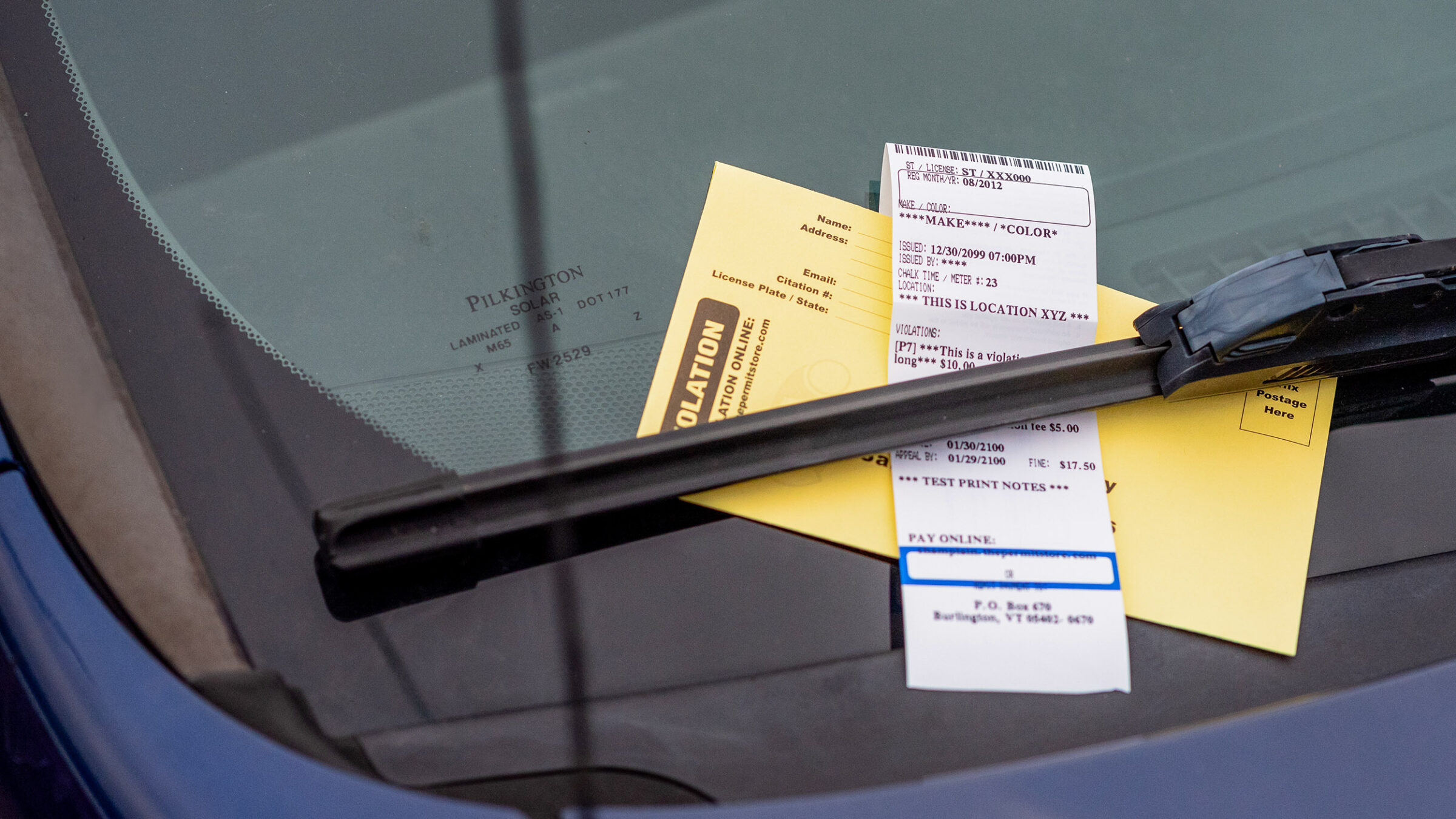 parking ticket on a windshield