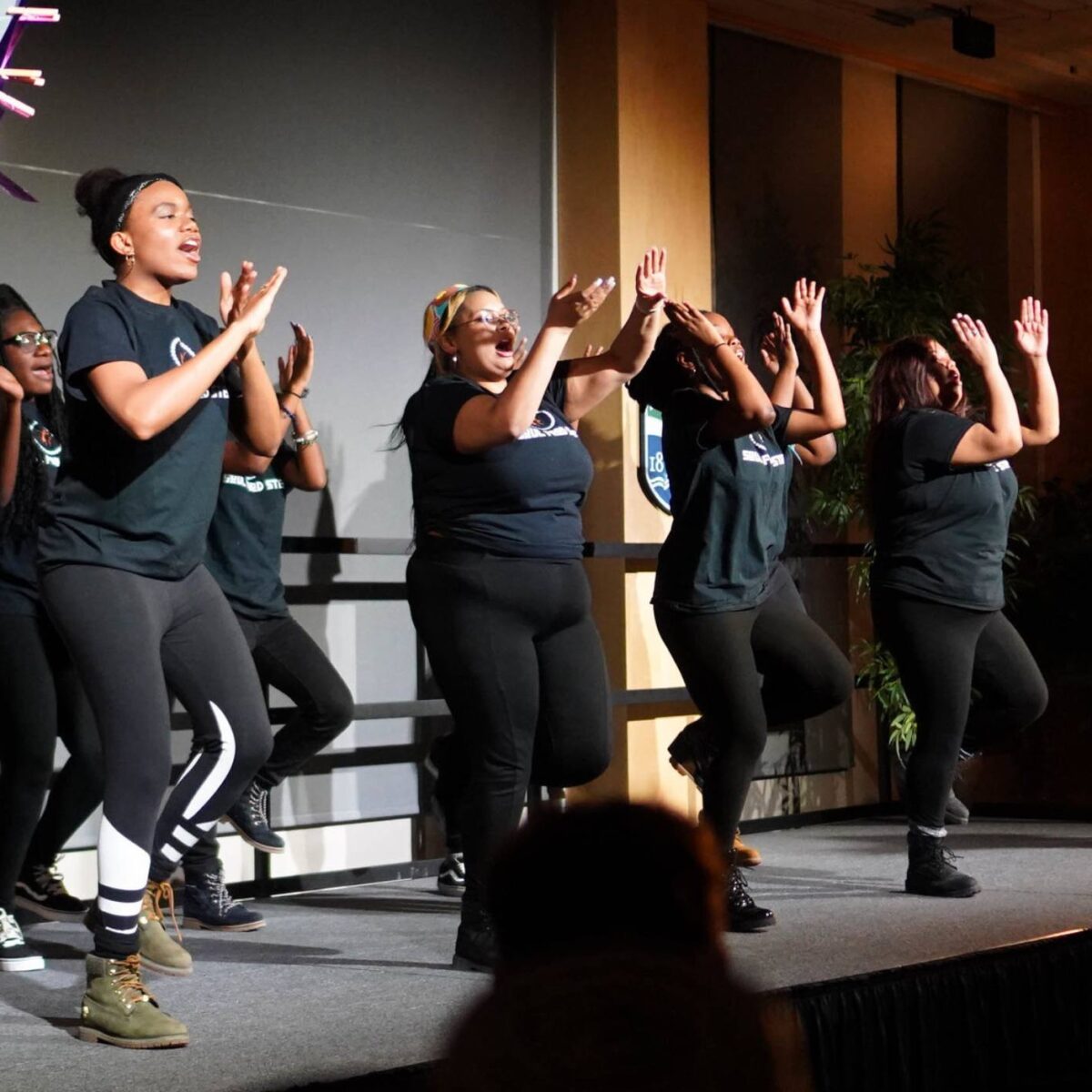Soul Food Step students dancing on stage in the Champlain Room