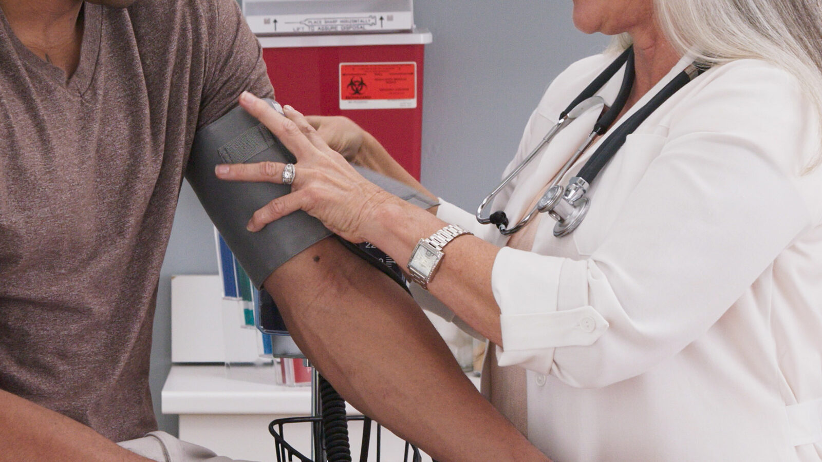 blood pressure cuff on a patient