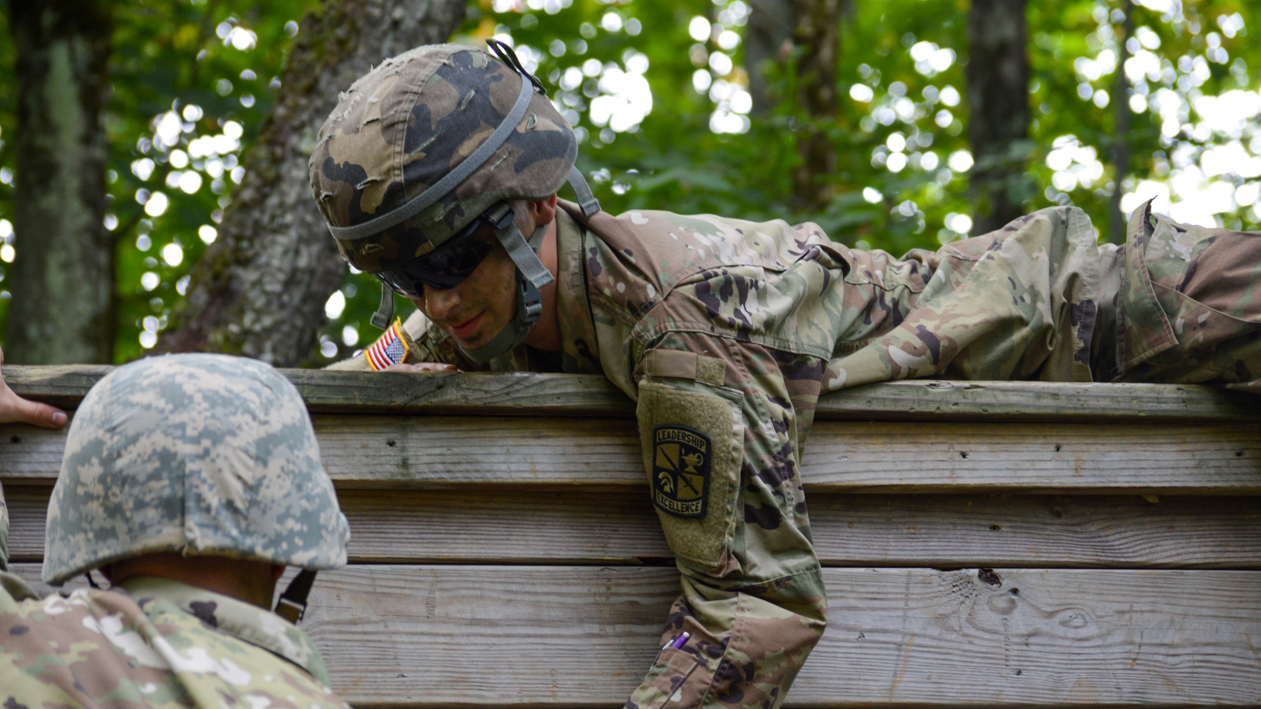 ROTC students training in an obstacle course