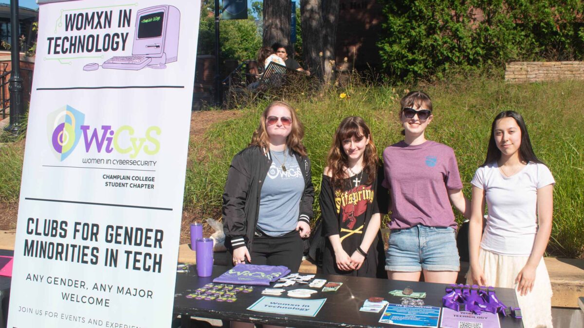 Womxn in Tech club at the activity fair outside of IDX