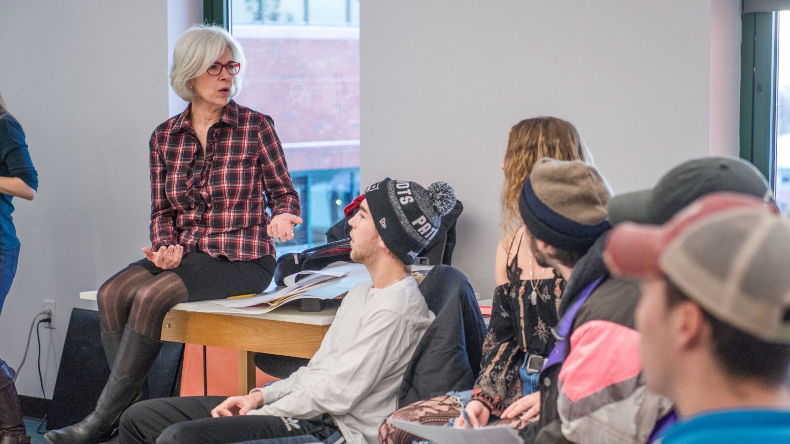 Students and Faculty in class listening to a lecture