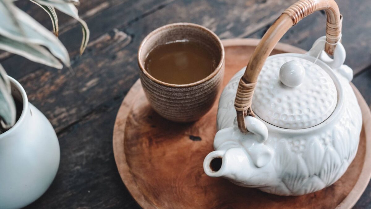 Tea pot and mug on a serving tray