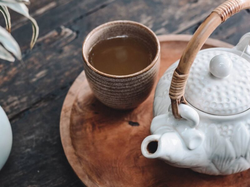 Tea pot and mug on a serving tray