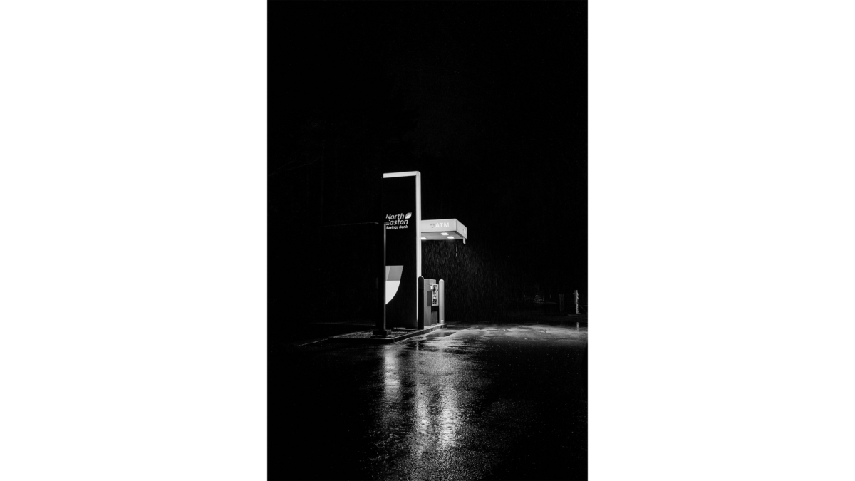 black and white photography of a gas pump in the rain by a graphic design & visual communication student