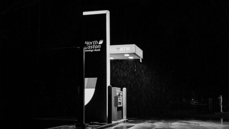 black and white photography of a gas pump in the rain by a graphic design & visual communication student
