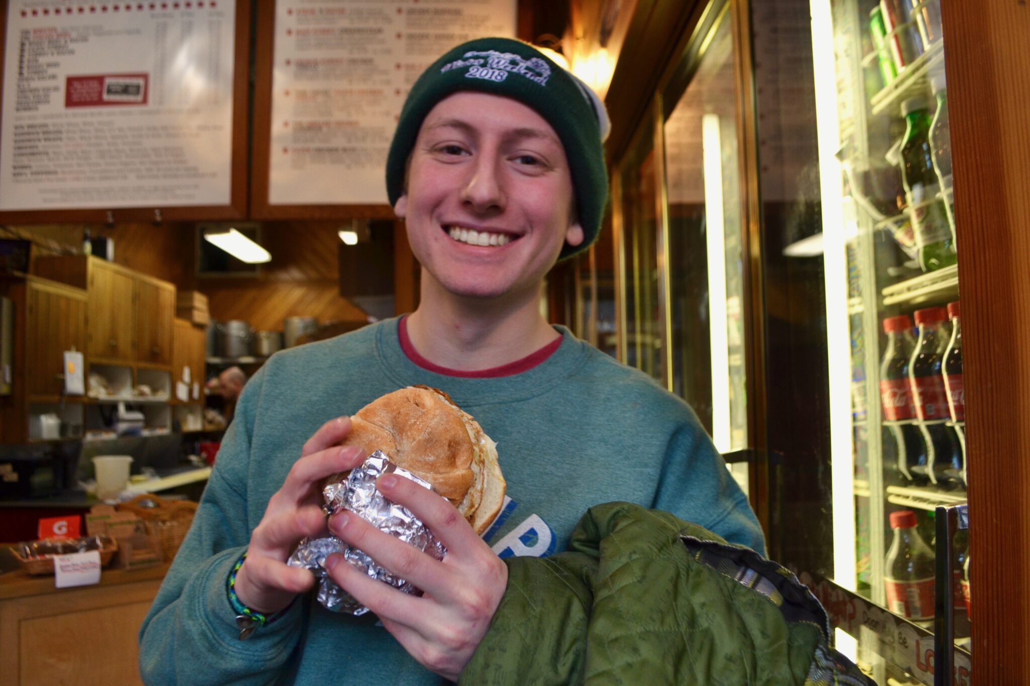 Adan eats at Kountry Kart Deli