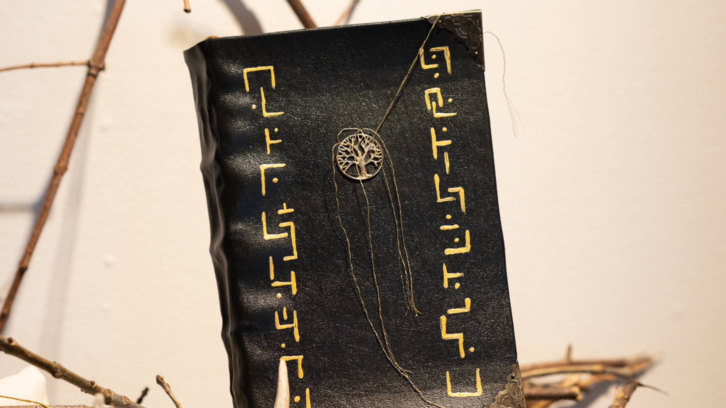 a leather bound book made by a creative media student