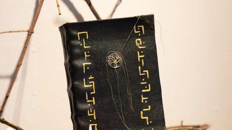 a leather bound book made by a creative media student