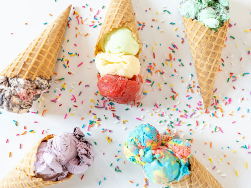 waffle cones filled with colorful ice cream