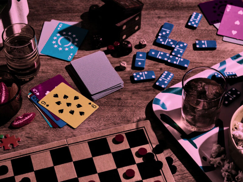 board games and popcorn dispersed along a wooden table