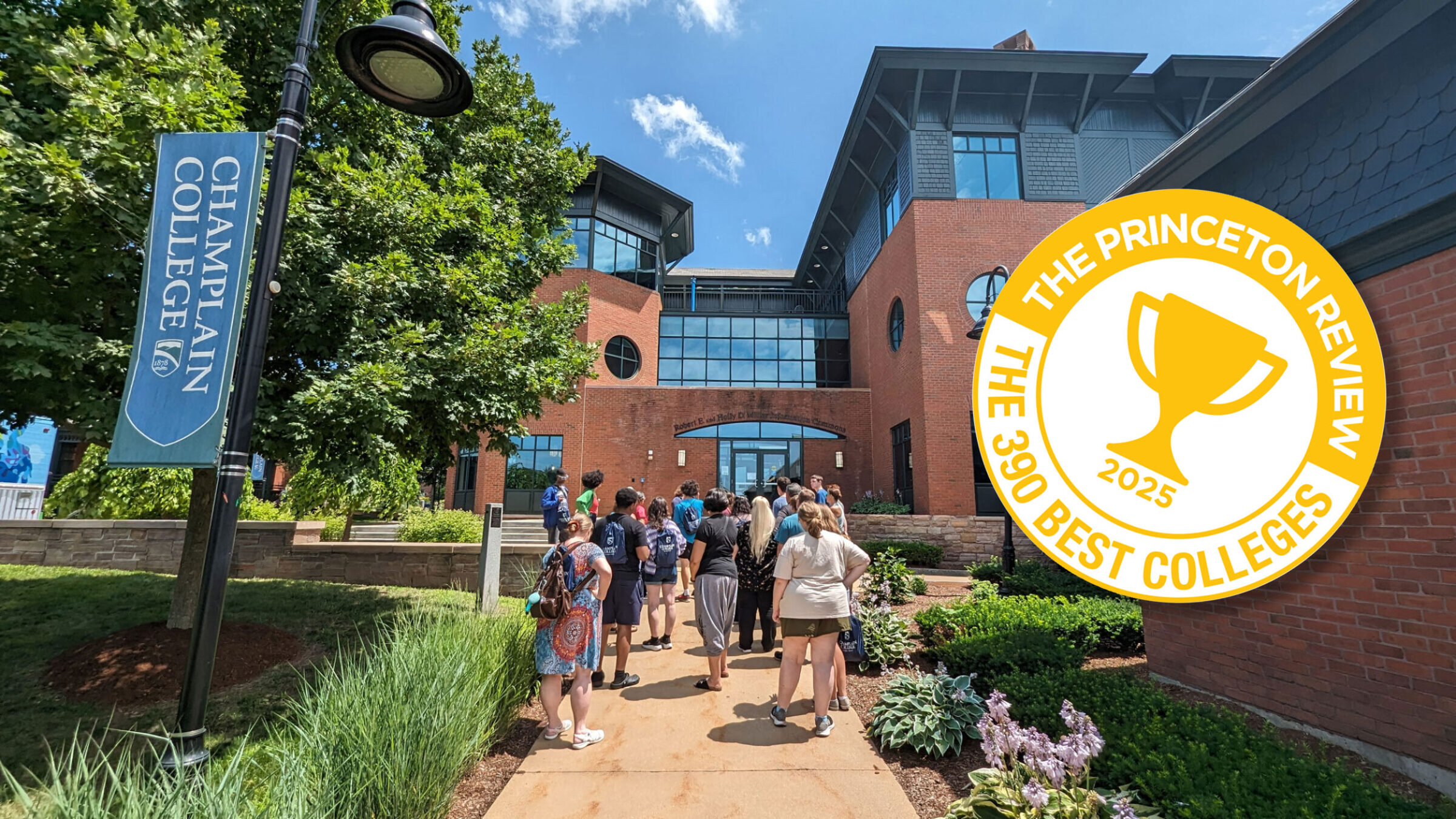 Champlain College tour in progress and a 2025 Best Colleges badge from the Princeton Review