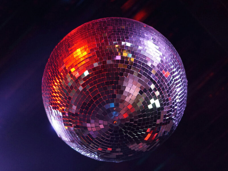 silver sparkly disco ball hanging from ceiling