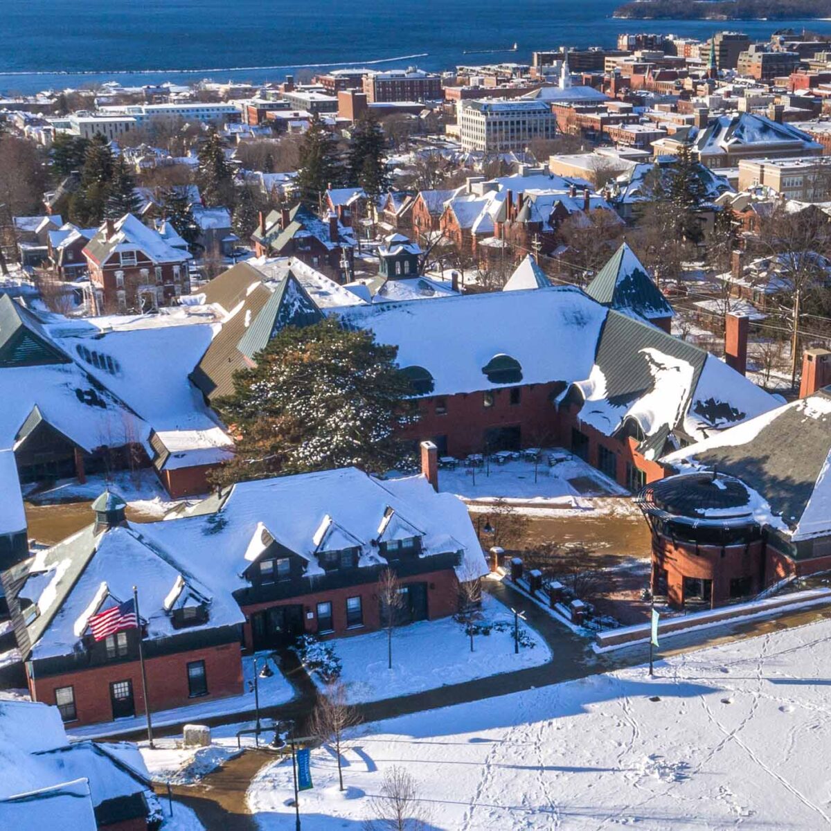 Aerial photo of Burlington Vermont and Champlain's campus in the winter