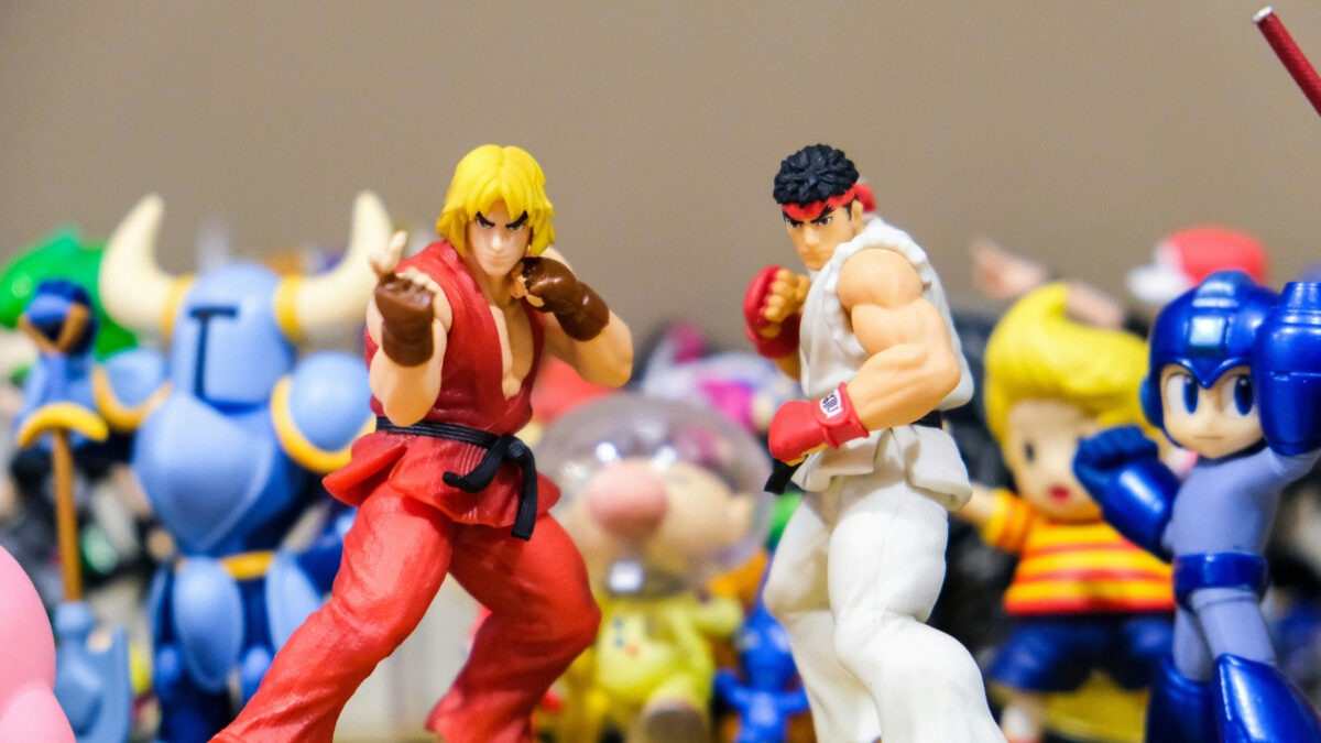 A collection of figures from popular fighting games on a table